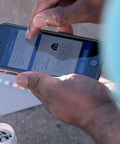 User checking pool chemical readings on a smartphone using Six Way Pool Water Test Strips For Rapid Chemical Readings With Seamless App Sync To Keep Your Backyard Hangout Sparkling All Summer Long Without Any Headaches Or Sticker Shock From Costly Store Visits.