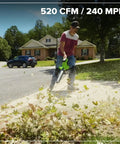 Man using Three In One Cordless Leaf Blower Vacuum Mulcher With Dual 48V Batteries And Fast Charger Delivers 520 CFM And 240 MPH