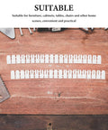 Two rows of Heavy Duty Drywall Anchors Kit 300 Pcs Plastic Wall Expansion Anchors on a wooden surface with tools.