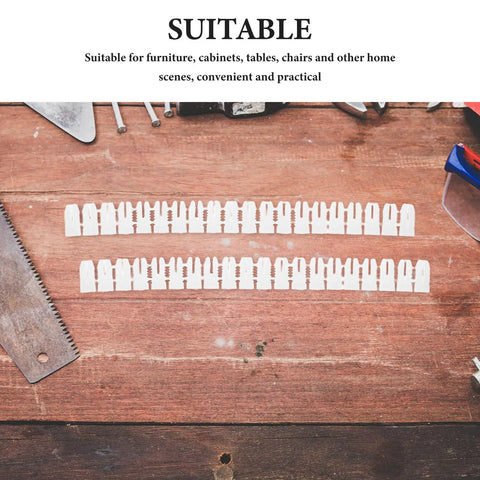 Two rows of Heavy Duty Drywall Anchors Kit 300 Pcs Plastic Wall Expansion Anchors on a wooden surface with tools.