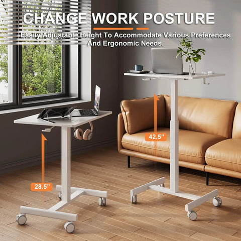 Mobile T Shaped Pneumatic Height Standing Desk on Lockable Wheels in home office setup next to a sofa