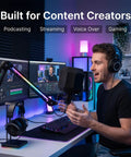 Man using Home Studio Vibe Microphone Isolation Shield with Pop Filter in podcasting setup, showcasing clear recordings and noise control.