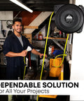 Man using Retractable Extension Cord Reel With 50 Ft Reach, 14 AWG, 3 Outlets, Ceiling Or Wall Mount, Yellow And Grey in workshop