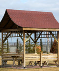 Heavy Duty Concrete Fence Post Base 4x4 Inches Four Pack under wooden pergola with red roof, steel post anchor holder visible.