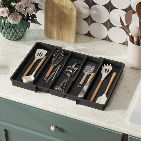 Expandable Kitchen Utensil Organizer for Drawers, Adjustable Cutlery Tray and Spatula Holder, 3 Large Compartments Plus Side Expandable Slots shown on countertop