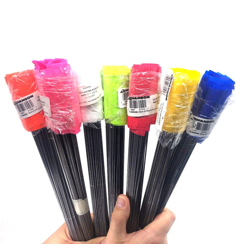 Assorted colored marking flags with 15-inch wire staffs, including visible tags and packaging.