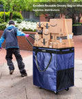 Person pulling Navy Medium Reusable Grocery Bag On Wheels With 70L Foldable Rolling Tote Carries Up To 66 Lbs through urban area