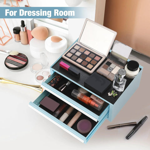 Open makeup organizer with eyeshadow palette, cosmetics, and two drawers filled with makeup items, labeled 'For Dressing Room'.