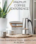 Stovetop Espresso Maker 9 Cup Moka Pot In Stainless Steel 450ml 15oz on a wooden table near two mugs