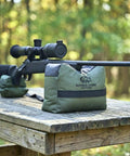All Weather Front And Rear Shooting Bag Combo For Target Practice And Bench Rest Use Durable Olive Drab Bags For Hunting AR-15 AR-10 Shotgun And Pistol Unfilled And Ready To Fill in outdoor setup with rifle on wooden bench