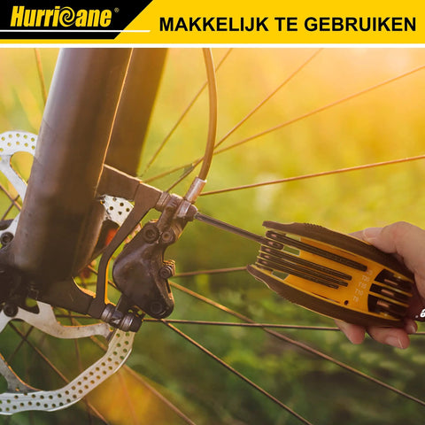 Hand using Foldable 25 Piece Hex Key Set With SAE Metric Torx 270 Degree Swivel For DIY on bike brake adjustment