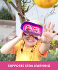 Child using Pink Kidnoculars Lightweight Kids Binoculars For Outdoor Adventures For Ages Four To Eight Screen Free Bird Watching Gear with Neck Strap