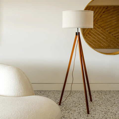 Eden Tripod Floor Lamp Dimmable LED With Solid Wood Legs, standing in modern living room with mid-century design.