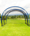 Pop Up Baseball Batting Cage With Portable Fiberglass Frame And Polyester Netting setup outdoors on grass