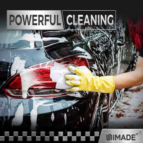 Person using 100 Pack Heavy Duty Shop Towels Microfiber Cleaning Rags For Cars And Auto Detailing on taillight, wearing glove