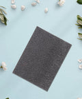 Pearl Cotton Foam Sheets 2 Pack Ultra Tear Resistant Soft Cushioned Pad on light blue background with flower petals