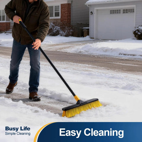 Man using 18 Inch Push Broom Heavy Duty Outdoor Commercial Broom With Stiff Bristles For Cleaning snow on driveway