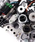 Close-up of Solid Grip CVT Transmission Valve Body Featuring Knockout JF011E RE0F10A Replacement with connectors and valve assembly.