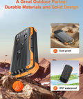 Solar Charger Power Bank 40000mAh With PD 20W Fast Charging Built In 4 Cables Dual Bright Flashlights IP67 Waterproof Outdoor Phone Charger For Camping Hiking And All Day Adventures, displayed outdoors with dust-proof and IP67 waterproof features