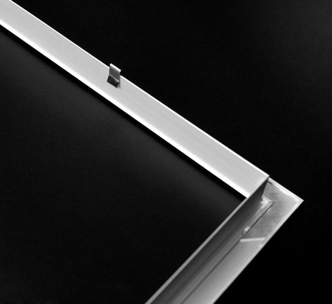 Close-up view of Aluminum Privacy HVAC Air Grille 24 By 24 With V Shaped Louvers Blocks 100 Percent View While Still Allowing Air Flow