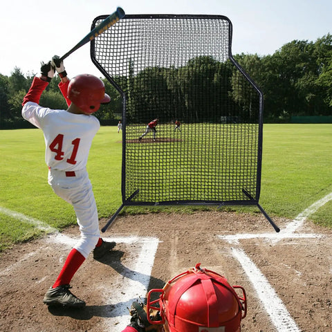Z Screen Pitching Net 5x7 Ft Portable Baseball Backstop in use during a baseball practice on a grass field.