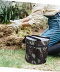 Gardener using Portable Gardening Wearable Stool Grab And Go Lightweight Foam Work Seat for farming, camo design visible.