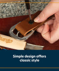 Person installing Top Notch Black Chicago Screws Pack Of 10 on leather strap with rustic tools for bags and belts.