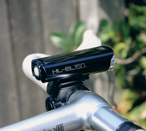 HL EL160 Bike Headlight With IPX7 Waterproof 50 Lumen LED And OptiCube Lens, 30 Hour Constant Run Time, 250 Hour Flashing Mode, Low Battery Indicator, AA Powered, Flextight Mount, Fits Road Urban MTB And Gravel Bikes