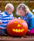 Two children admiring a Jack-o'-lantern with 24 Pack Flickering LED Tea Lights With Timer 6 Hour Auto On Off Battery Operated Flameless Tealights For Wedding Party Home Decor Warm White Durable Plastic Candles For Glass Or Paper Bag Displays Cozy Glow inside, outdoors.