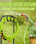 Freestanding Garden Hose Holder With 4 Spikes Heavy Duty Hose Reel Keeps 150 Ft Of Hose Neatly Stored in yard with child