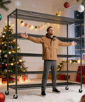 Heavy Duty Garage Shelving Unit With Wheels And Adjustable Feet, five-tier steel wire rack with man standing beside it