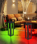 Solar Patio Floor Lamp 2 Pack Waterproof RGB Color Changing Garden Path Lights illuminating a patio with red and green hues.