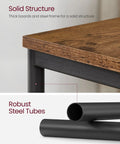 Close-up of Set Of Two Industrial Style End Tables With Rustic Brown Tops And Matte Black Steel Frames showing materials