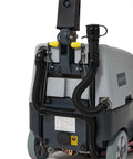 Battery Powered Walk Behind Floor And Carpet Scrubber Buffer Polisher rear view showing hoses and motor compartment.
