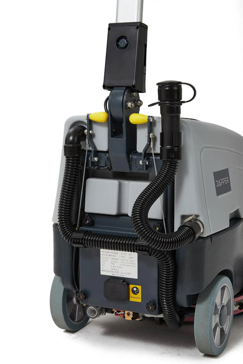 Battery Powered Walk Behind Floor And Carpet Scrubber Buffer Polisher rear view showing hoses and motor compartment.