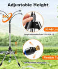 Outdoor Patio Water Mister System 26.5 Feet Portable Cooling Mister With Adjustable Height Stand Flexible Tubing And Wind Resistant Stainless Base for outdoor use on grass.