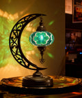 Turkish Stained Glass Moon Shape Table Lamp With Mosaic Lampshade Moroccan Crescent Tiffany Style Handmade Desk Light glowing on table