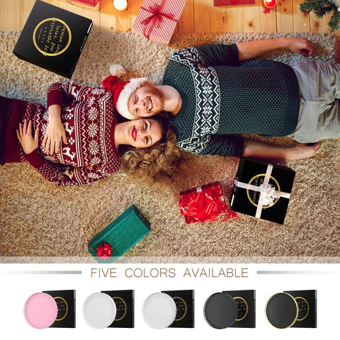 Couple in festive sweaters with holiday gifts and five color Lazy Susan options, including pink, white, grey, and black.