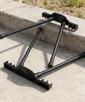 Hella Solid Folding Replacement Table Legs With Adjustable Height Support Stand For Outdoor Camping And Backyard Hangouts on concrete ground.