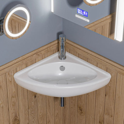 White 22 Inch Corner Wall Mounted Ceramic Porcelain Sink With Faucet Hole Durable Glossy Glaze For Small Bathrooms And Modern Quarters Ideal For Tight Spaces And Contemporary Baths installed in wood-paneled corner bathroom