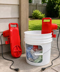 Real Deal Portable 5 Gallon Bucket Washing Machine With Rugged Rotary Agitator, fitted in a white bucket with colorful clothes.