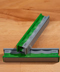 Dual Sided Knife Sharpener With Diamond Stones 1500 2200 Grits, two stones shown with different grit markings on wooden surface