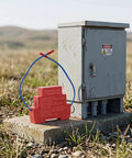 Automatic Fire Extinguisher 18G Aerosol Spray Kit Self Triggering Thermal Sensor Tech placed near a generator in outdoor setting.