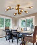 8 Light Sputnik Ceiling Light Fixture Semi Flush Mount With Glass Globe In Black And Gold Mid Century Modern Chandelier in dining room.