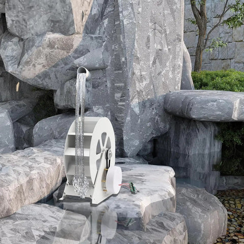 Outdoor Water Wheel Generator 50W And 100W For Ponds, Streams, Rivers And Canals, placed on rocks near a flowing stream.