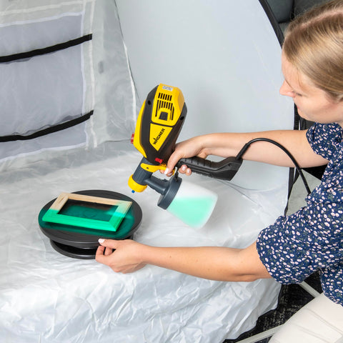 Person using Revolving Paint Spray Turntable With 11 Inch Round Platform For Spray Painting Projects And Crafting Smooth 360 Degree Rotation