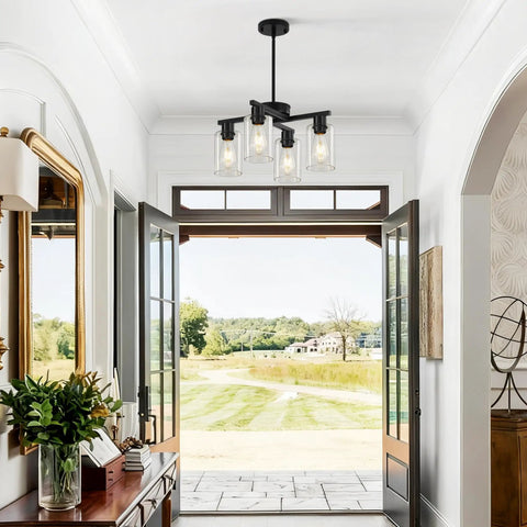 Four Light Black Farmhouse Chandelier With Adjustable Height Pendant Lighting For Dining Rooms featuring glass shades in an entryway.
