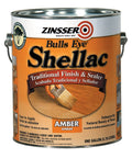 No Sweat Shellac Sealer And Heavy Duty Odor Blocker For Wood Trim And Paneling Covers Hundreds Of Square Feet Fast Drying Non Toxic Formula For A Smooth Mid Tone Sheen In Badass Amber One Gallon can with brush showcasing amber finish.