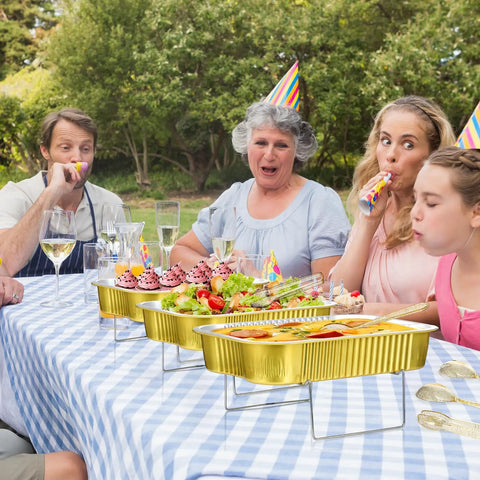 Family party using Four Sets Disposable Chafing Dishes Buffet Set with chafer wire racks, aluminum pans with lids on picnic table