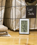 Indoor Temperature Station with Humidity Alerts for Home Comfort Real Time Temp and Humidity Readouts on wooden surface